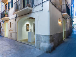 Beautiful street of Palma de Mallorca with the entrance to Art Gallery Can Boni.